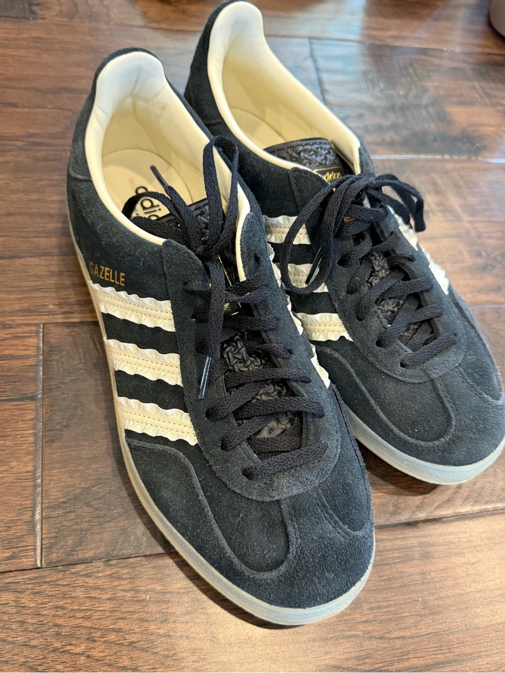 adidas Gazelle Black Suede Sneakers with White Stripes and Gold Branding